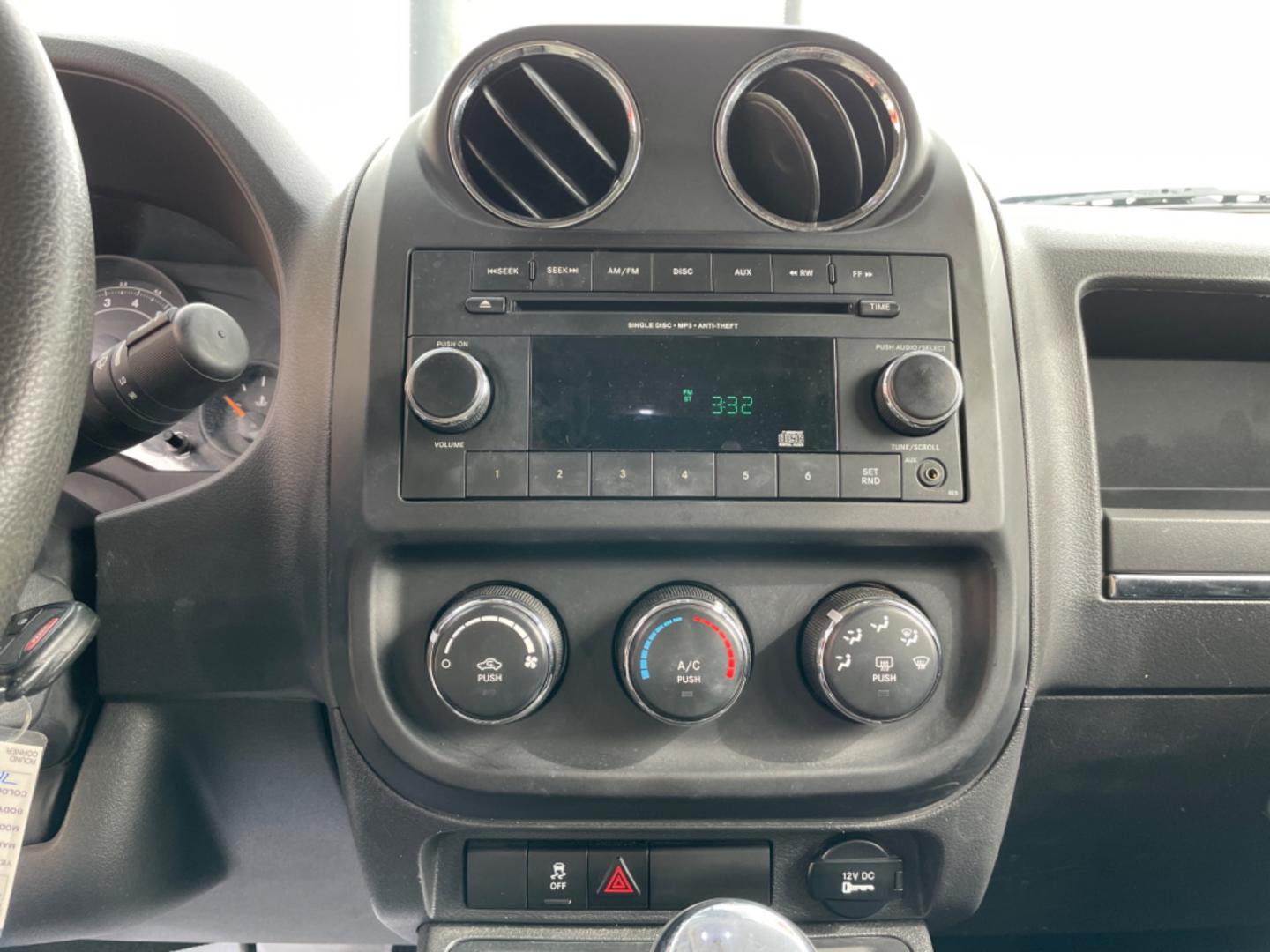 2014 White Jeep Patriot (1C4NJPBAXED) with an 4-Cyl, 2.0 Liter engine, Automatic, 6-Spd w/AutoStick transmission, located at 8008 Warden Rd, Sherwood, AR, 72120, (501) 801-6100, 34.830078, -92.186684 - Photo#17